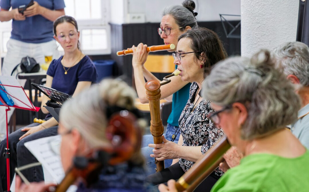 Older adults singing together in a choir group