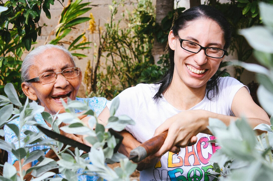 seniors gardening together